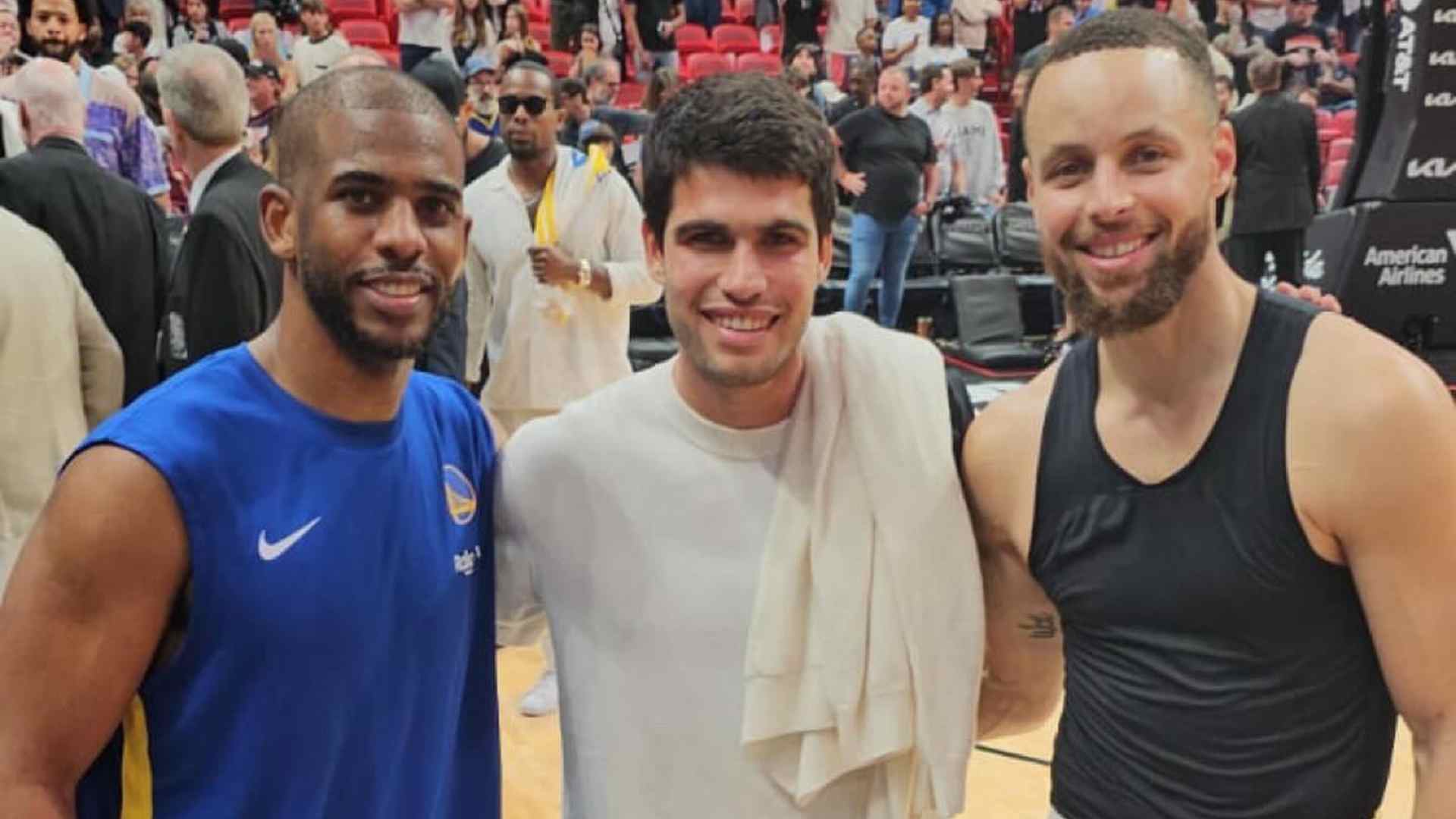 Carlos Alcaraz (centre) poses for a photo with NBA stars Chris Paul and Stephen Curry on Tuesday in Miami.