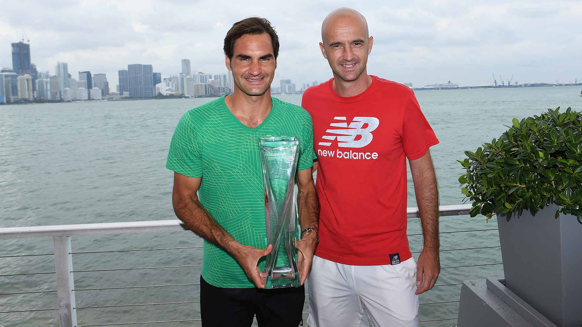 Roger Federer celebrates his third Miami Open title with coach Ivan Ljubicic, whom he defeated in the Miami title match in 2006.