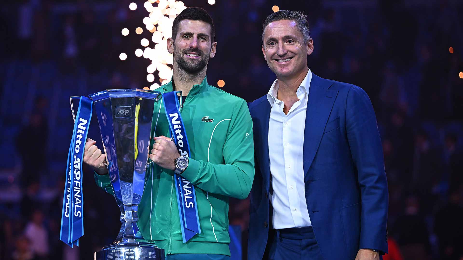 <a href='https://www.atptour.com/en/players/novak-djokovic/d643/overview'>Novak Djokovic</a> celebrates his seventh <a href='https://www.atptour.com/en/tournaments/nitto-atp-finals/605/overview'>Nitto ATP Finals</a> title with ATP Chairman <a href='https://www.atptour.com/en/players/andrea-gaudenzi/g254/overview'>Andrea Gaudenzi</a>.