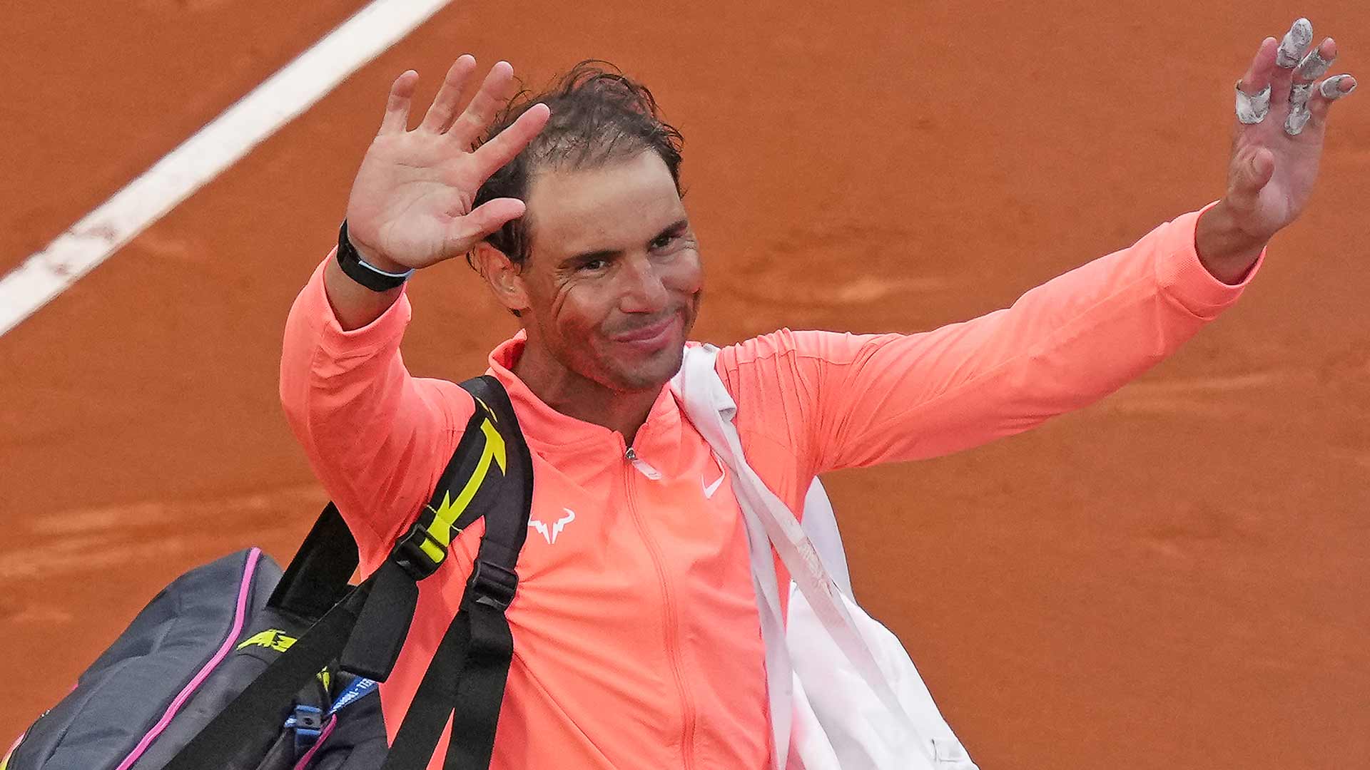Rafael Nadal waves to the crowd after his second-round defeat to Alex de Minaur on Wednesday in Barcelona.